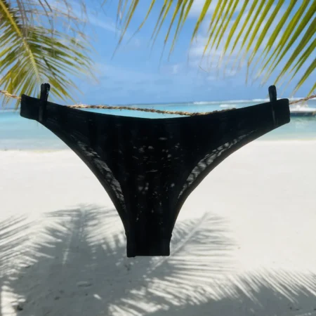 Tina tan-through cheeky bikini bottom for comfortable beach experience.