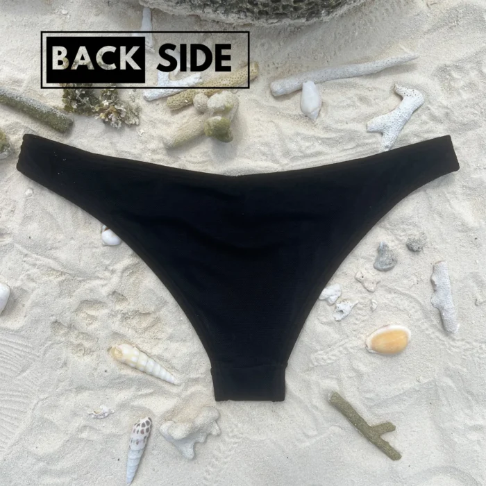 Mid-rise Tina bikini bottom for a comfortable beach day.